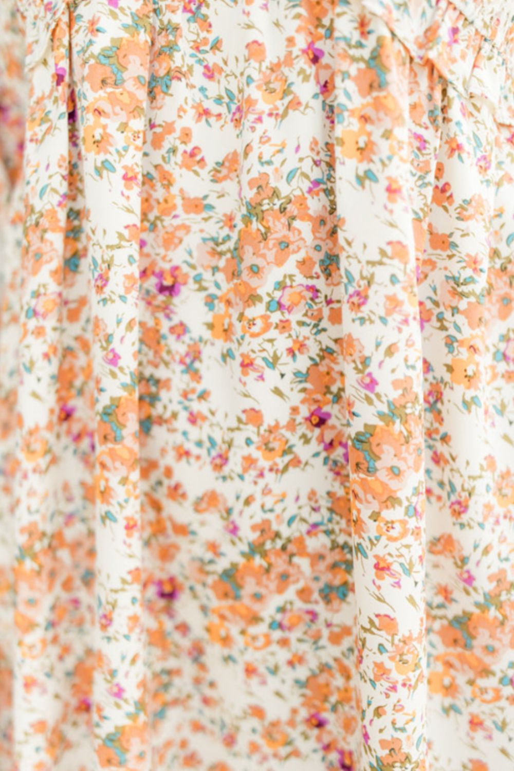 Arielle - Minivestido estampado com decote em V e mangas bufantes