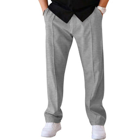 Cómodo pantalón de corte ancho para homem, confeccionado em um material leve e arejado
