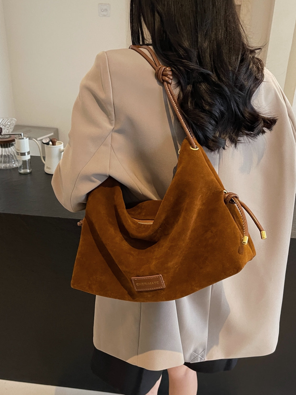 Bolso grande de camurça